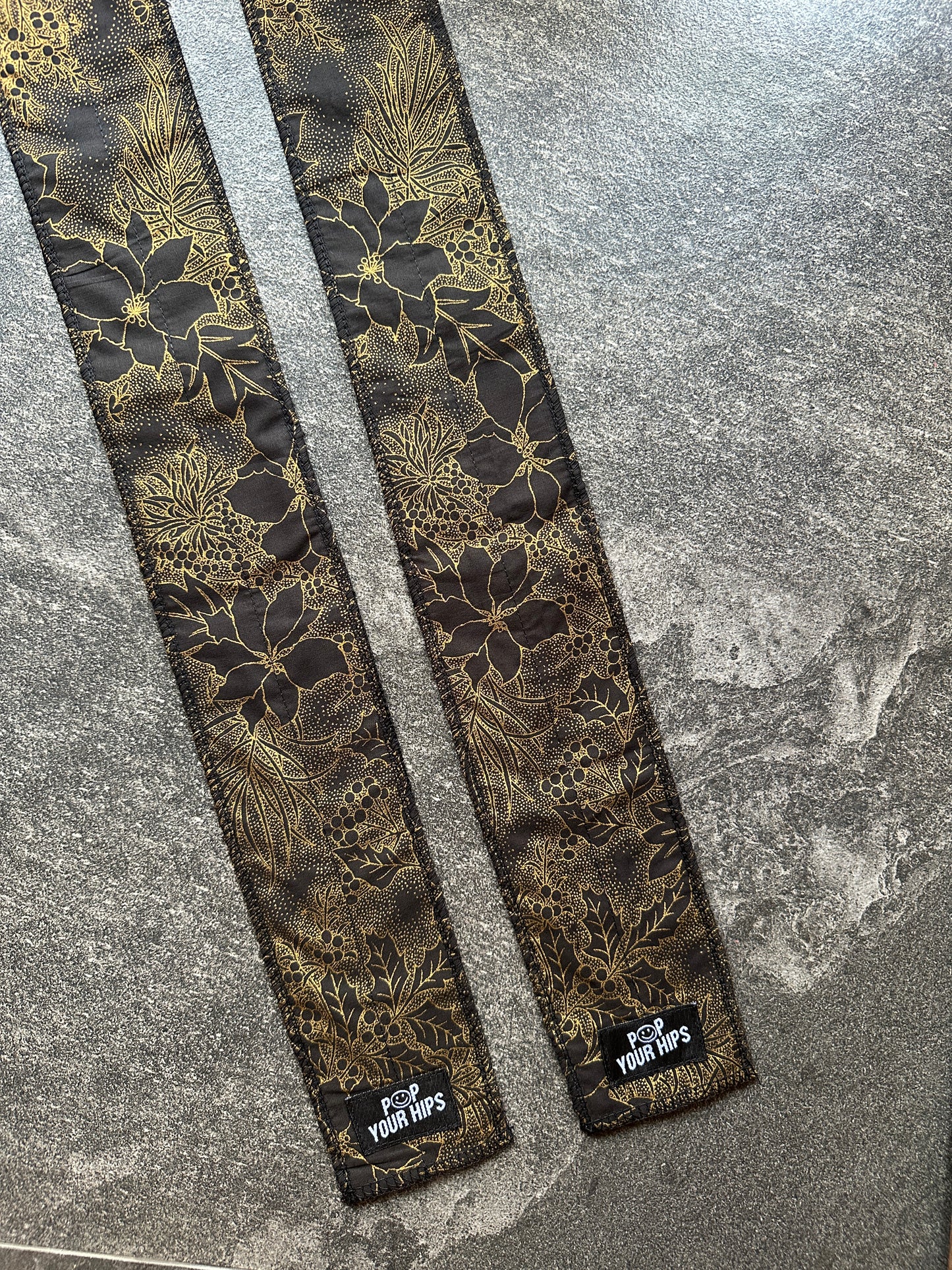 Metallic floral wrist wraps