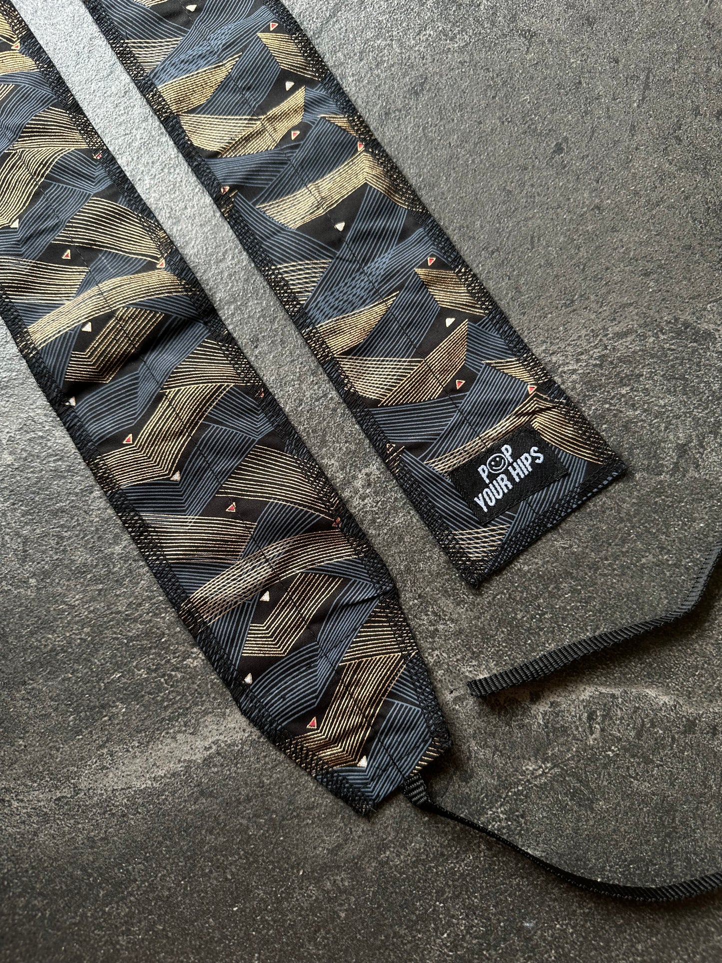 Gold geometric wrist wraps