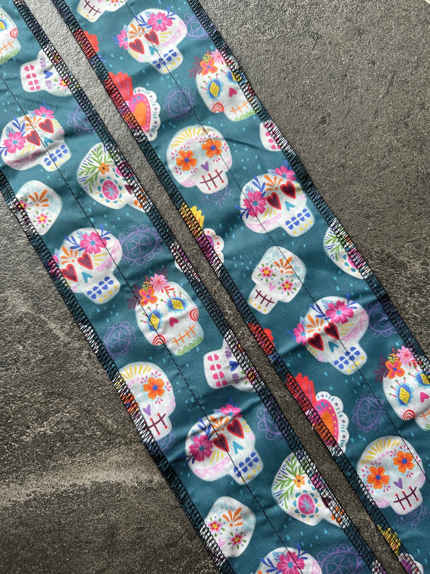 Teal skulls wrist wraps