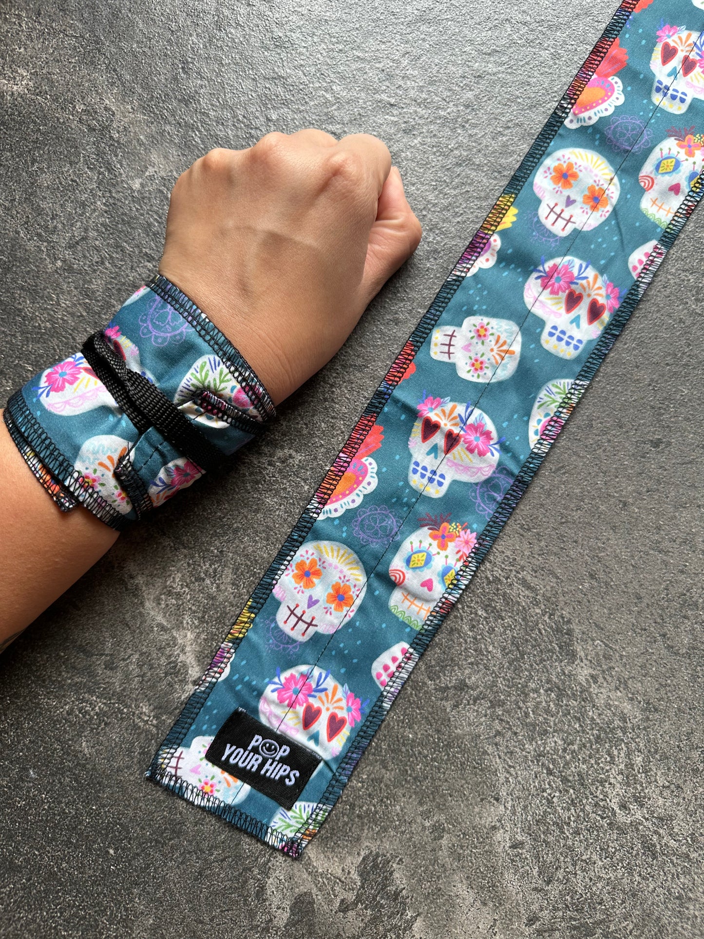 Teal skulls wrist wraps