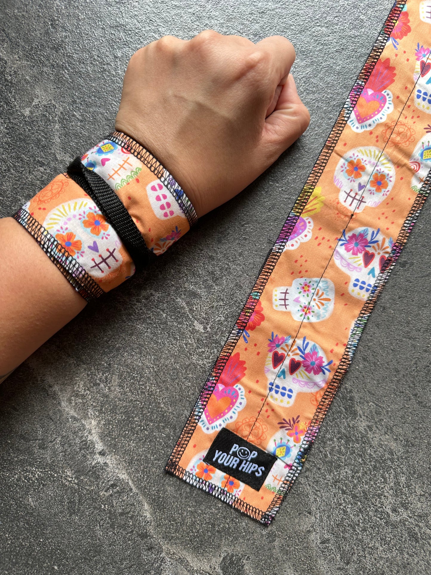 Orange skulls wrist wraps