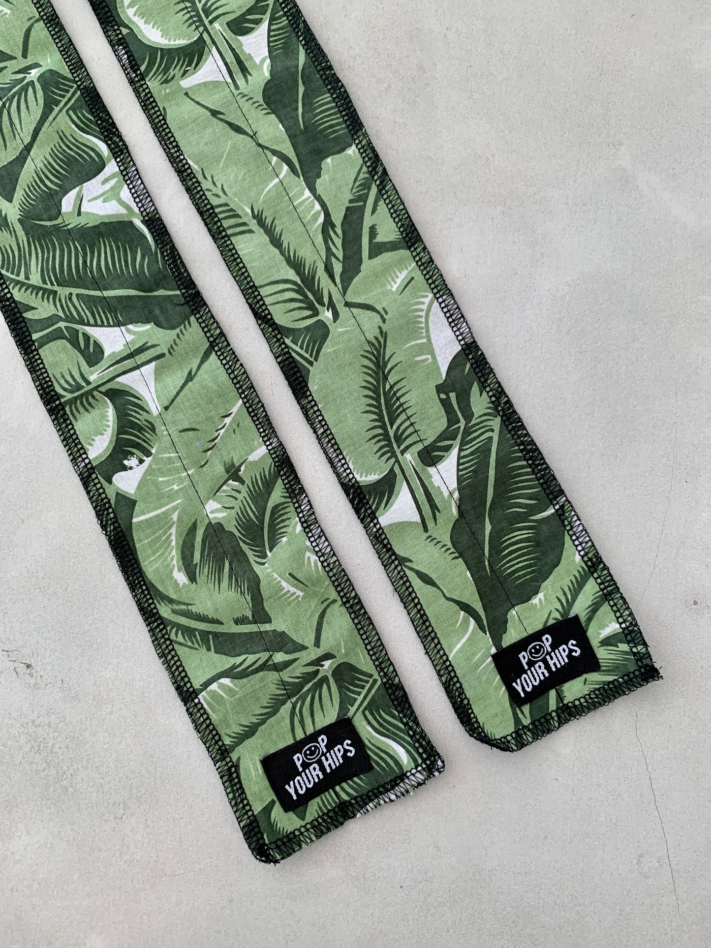 Green tropical wrist wraps