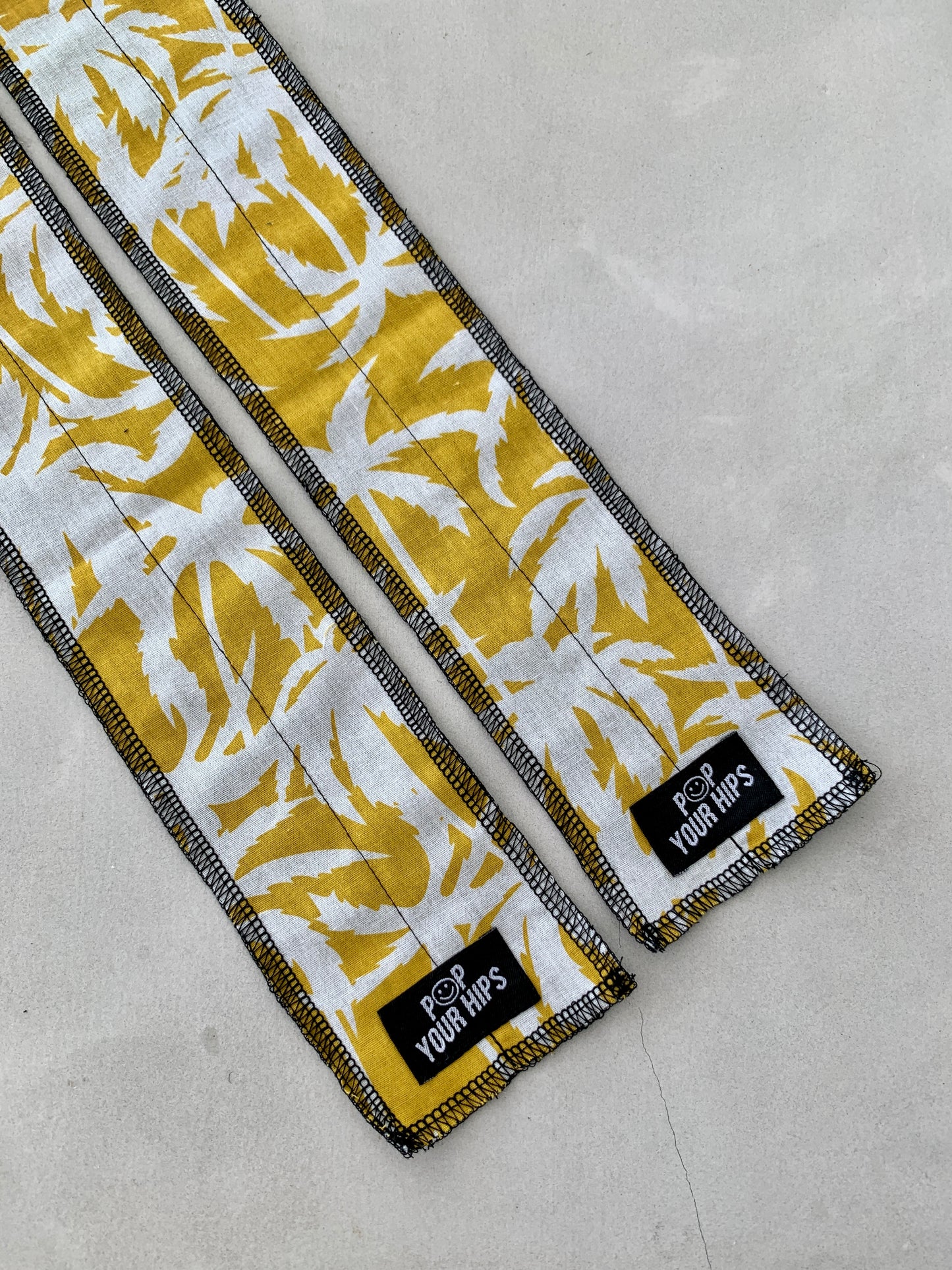 Yellow palms wrist wraps