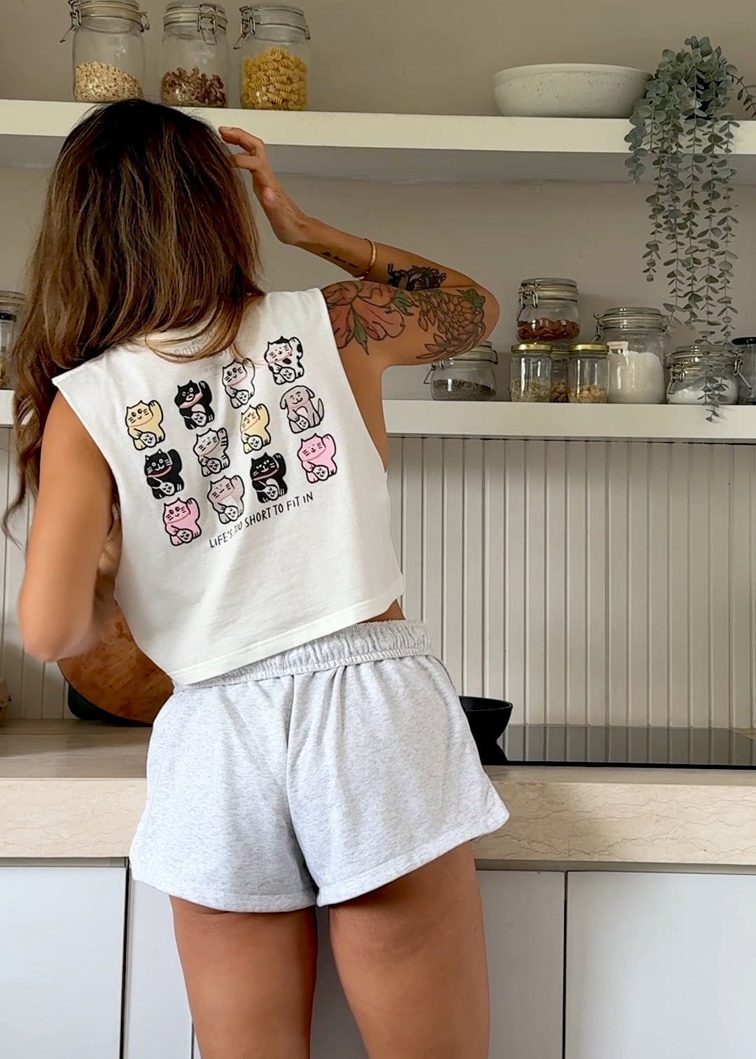 Life's too short to fit in cropped muscle tank