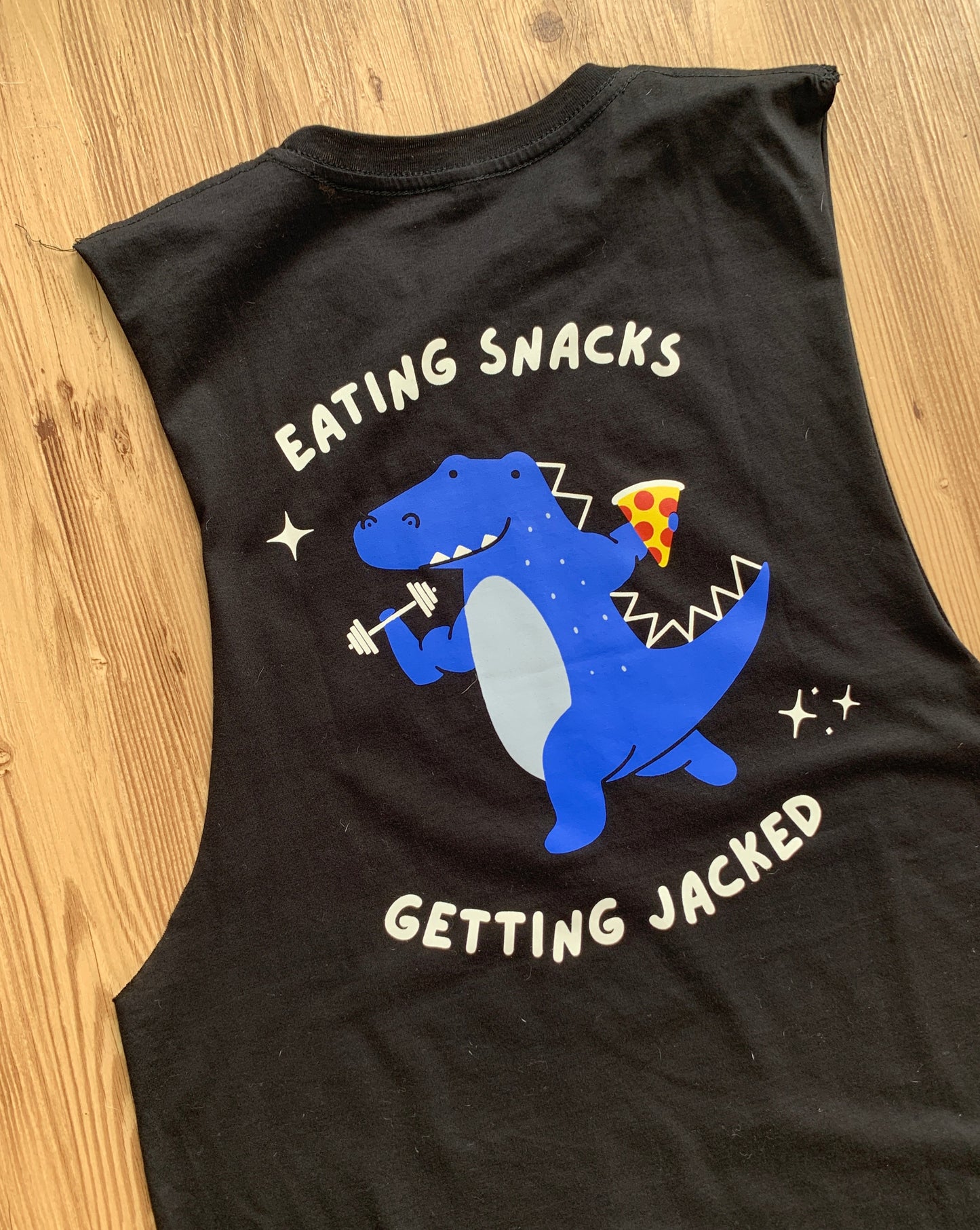 Eating snacks getting jacked muscle tank